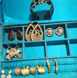 A Brown and gold bracelet set